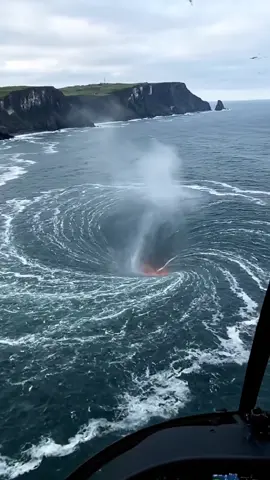 Helicopter point of view - Cornwall, England. The Cliffs of Moher  Whirlpool with an interesting center… Follow Earth Impacts Made with ai - Click the link in our bio how to make videos like this! #earthimpacts #ai #england #theuk