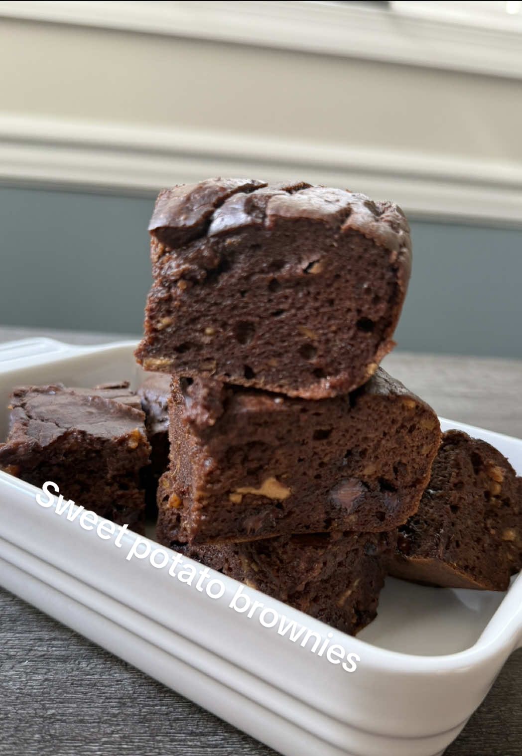 I’ve wanted to share this recipe with you for so long!  Sweet potato brownies: Gluten free, no added sugar (if you skip the chocolate chips), and of course guilt free… as I say to myself finishing the entire pan.  1:1 ratio for sweet potato to nut, since sizes vary per potato. Below is my fave recipe to use. 1/2 cup mashed sweet potato; 1/2 cup peanut butter (or nut butter of choice); 2 eggs; 1 tbsp maple syrup (or honey); 1 tsp vanilla; 1/2 tsp baking soda; pinch of kosher sea salt; 2 tbsp unsweetened cocoa powder; 1/8 cup semi sweet chocolate chips*. Mix all ingredients well, place in small casserole dish (I used 5”x7” le creuset) lined with parchment paper, bake at 350F/175C for 20-22 min. Let rest and cool before digging in… as in don’t burn your fingers like I did.  #EasyRecipe #sweetpotatobrownies #glutenfree #sugarfree #kaididey  Simple recipe for healthier, gluten free brownies. Sweet treat without the sugar high.
