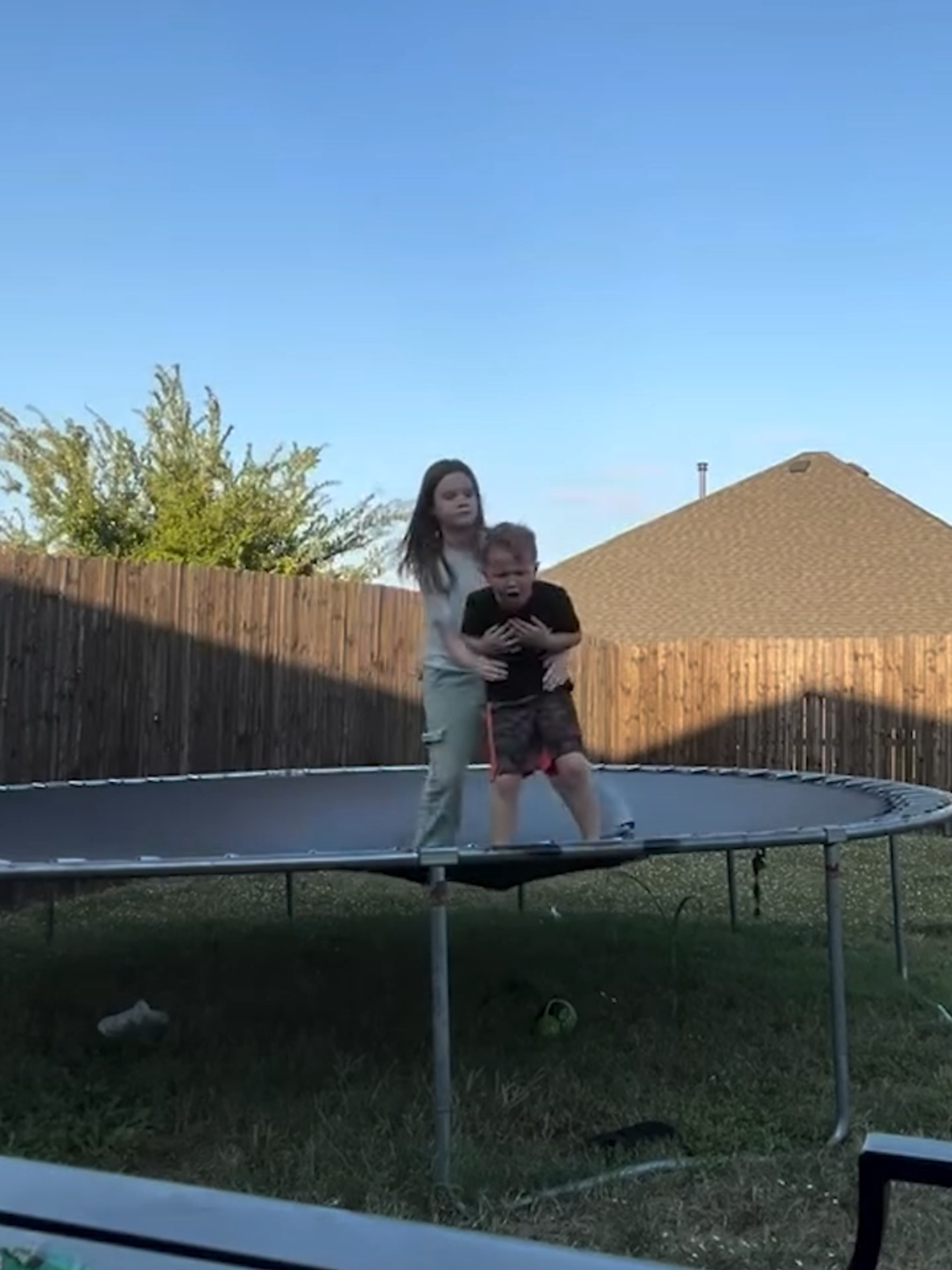 Best big sister ❤️ Heart-stopping video shows a sister quickly jump into action to save her little brother, who was choking on candy. Click the link in our bio for more. #sister #trampoline #texas #news #fox10news #linkinbio #fyp