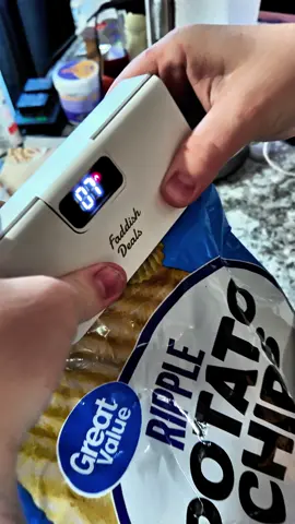 Seal and reopen snack bags in seconds. This rechargeable mini bag sealer keeps food fresh, saves space, and sticks right to your fridge. #kitchenhack #minibagsealer #tiktokfinds #foodstoragehack #snacksmart