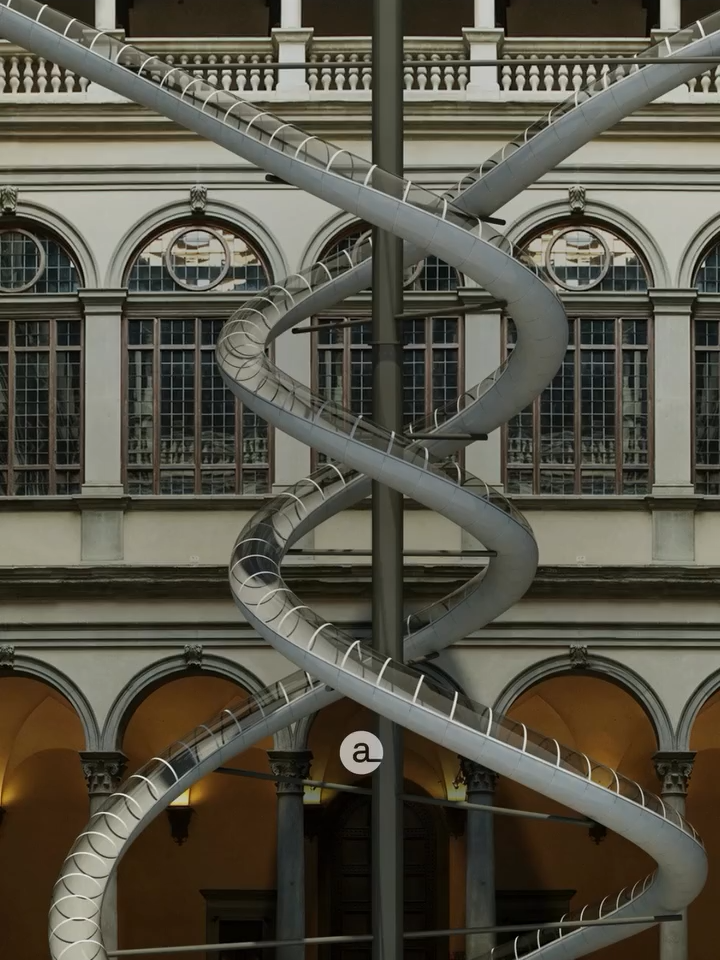 Carsten Höller (@carsten.holler) creates large, spiraling slides as interactive artworks that merge playfulness with psychological and sensory exploration. Installed in museums and public spaces, his slides invite viewers to become participants, challenging traditional boundaries between art and experience. Höller sees them as “devices for experimentation,” designed to evoke joy, disorientation, and altered perception—encouraging people to reconsider how art can engage the body and mind simultaneously