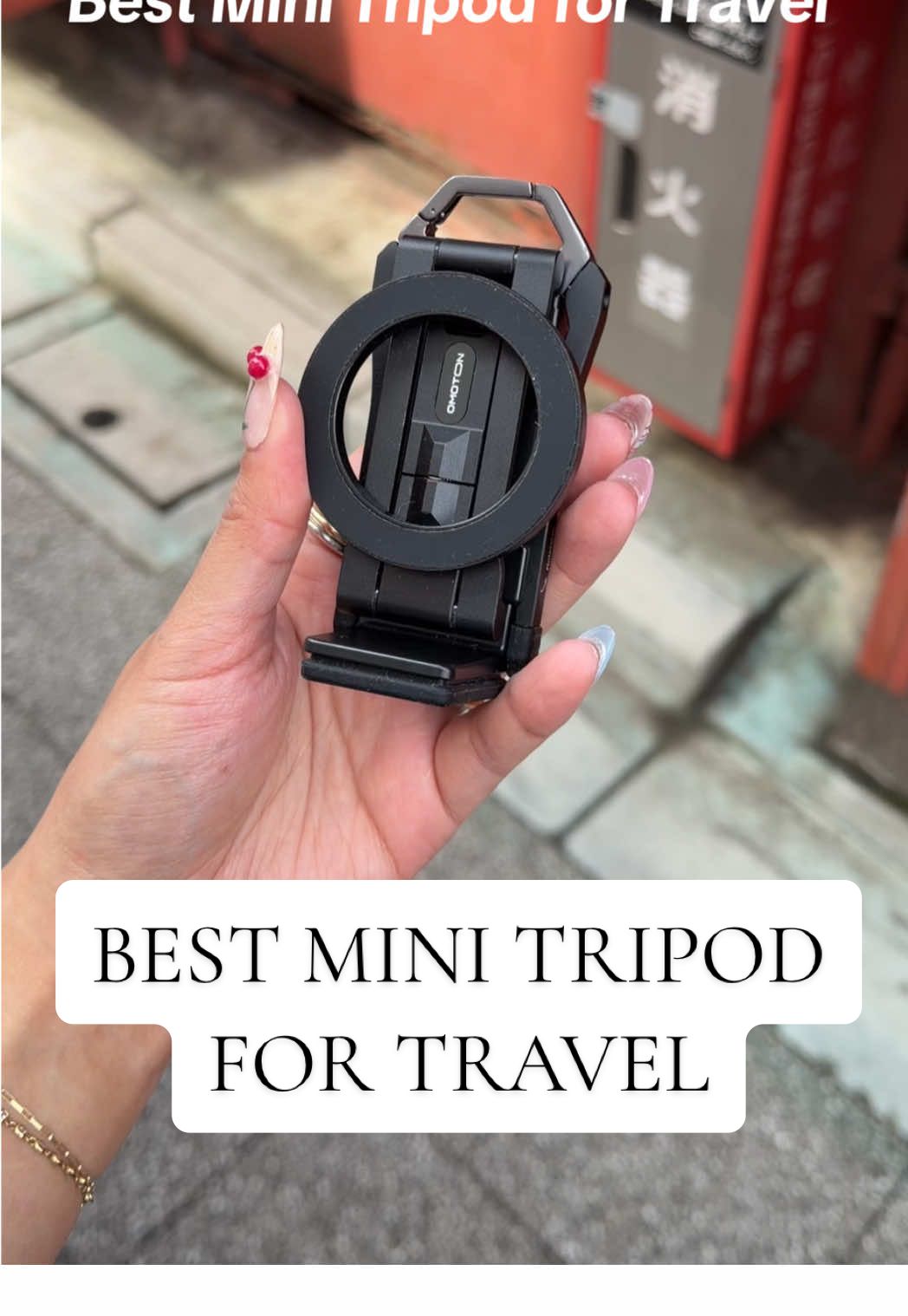 Love this tripod and all its features. It stands at a good height, tilts, rotates, clamps, MagSafe, magnet, and there’s a carabiner! I highly recommend it for on the go content! #minitripod #traveltripod #japantravel #omoton #tripod 