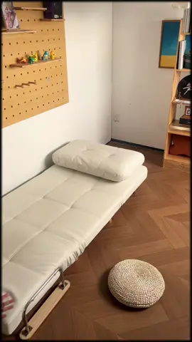 This white leather sofa easily turns into a comfy bed — perfect for small spaces and lazy weekends #Lifestyle #homedecor #furnituredesign 