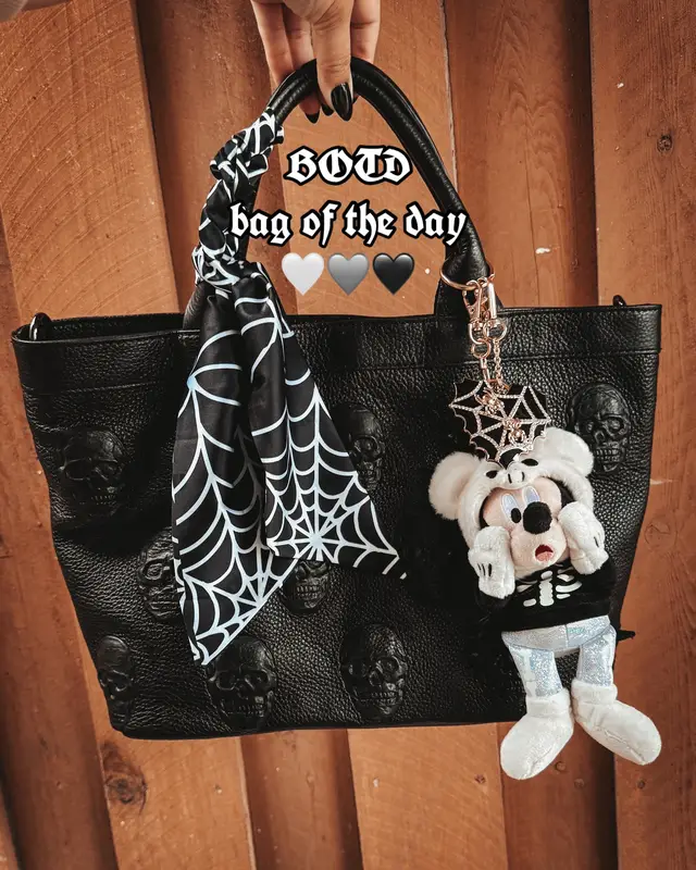 🔸◼️🎃 13/31 🎃◼️🔸 •🔶• 31 days of Halloween Bags •🔶• Heavily influenced by @InTheWorkPlaceCrafts to get this bag 🖤 The details on this bag & the softness of the leather did it for me, it’s so good 🖤 🔗 in ShopMy 🏷️ - BOTD, Bag of the day, Skull Bag, bag charms, bag accessories, bag inspo #botd #bag #bagcharm #baginspo #halloween  @TJ Maxx @BaubleBar @Disney @Disney Style  