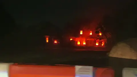 The fiery Halloween house on Main Street in Fountain Inn, South Carolina, it’s just an illusion (not actually on fire) #halloween #fire #spookyseason 