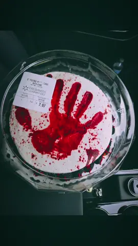 Bloody handprint cake in the passenger seat = me pretending I’m fine 🤣 Walmart really understood Halloween. #walmarthalloween #spookyseasonvibes 
