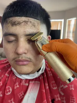 High taper with design and eyebrow slits  book appointment link in instagram bio @Michaelscutzzz located in LA #mustache #goatee #design #barber #lineup 