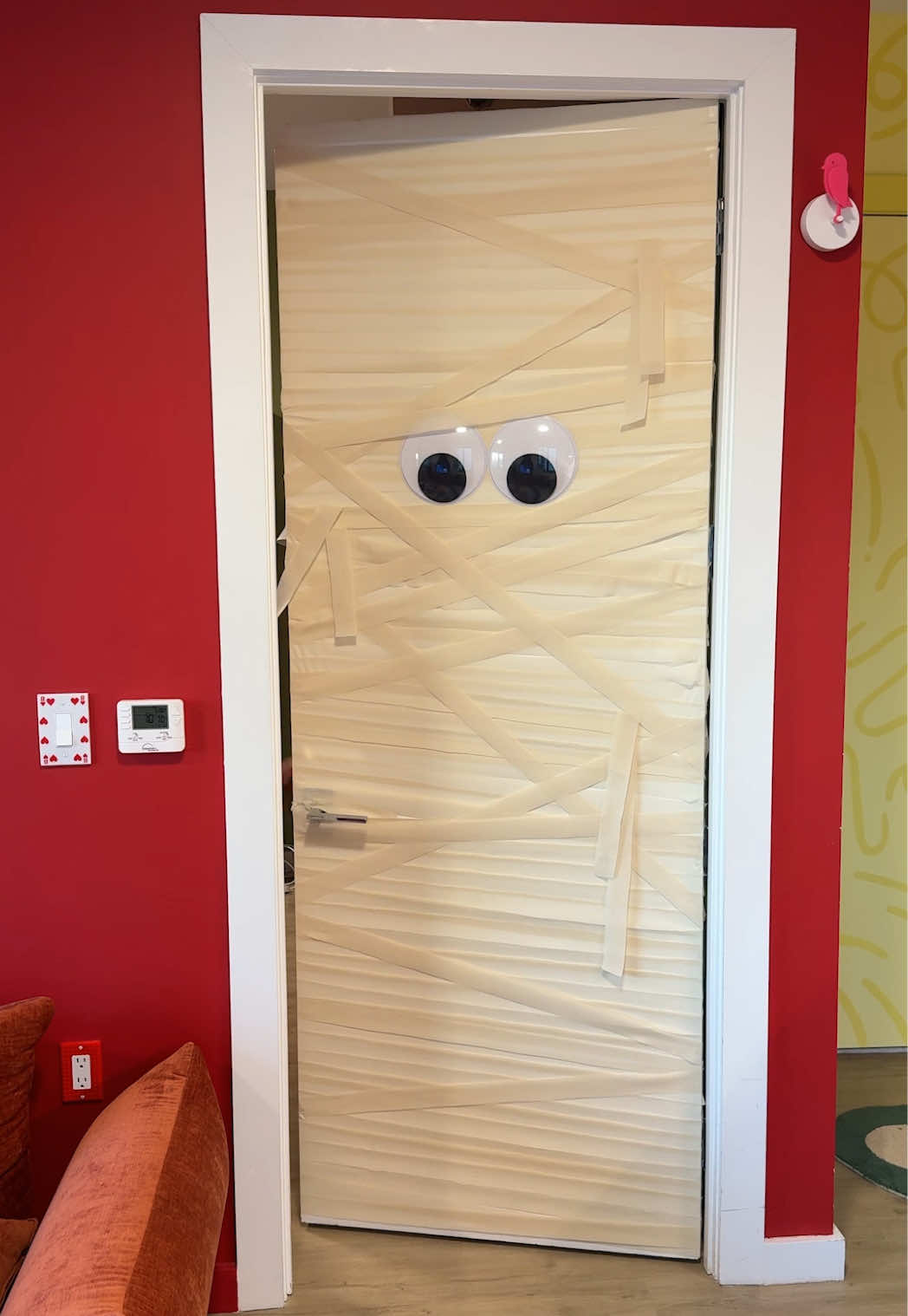 used like 5 rolls of streamers, tape, and googly eyes! #maximalistdecor #halloweendecor #diyprojects 