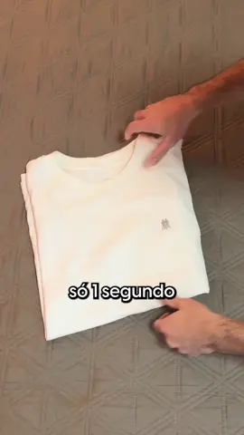 como dobrar camiseta em 1 segundo 