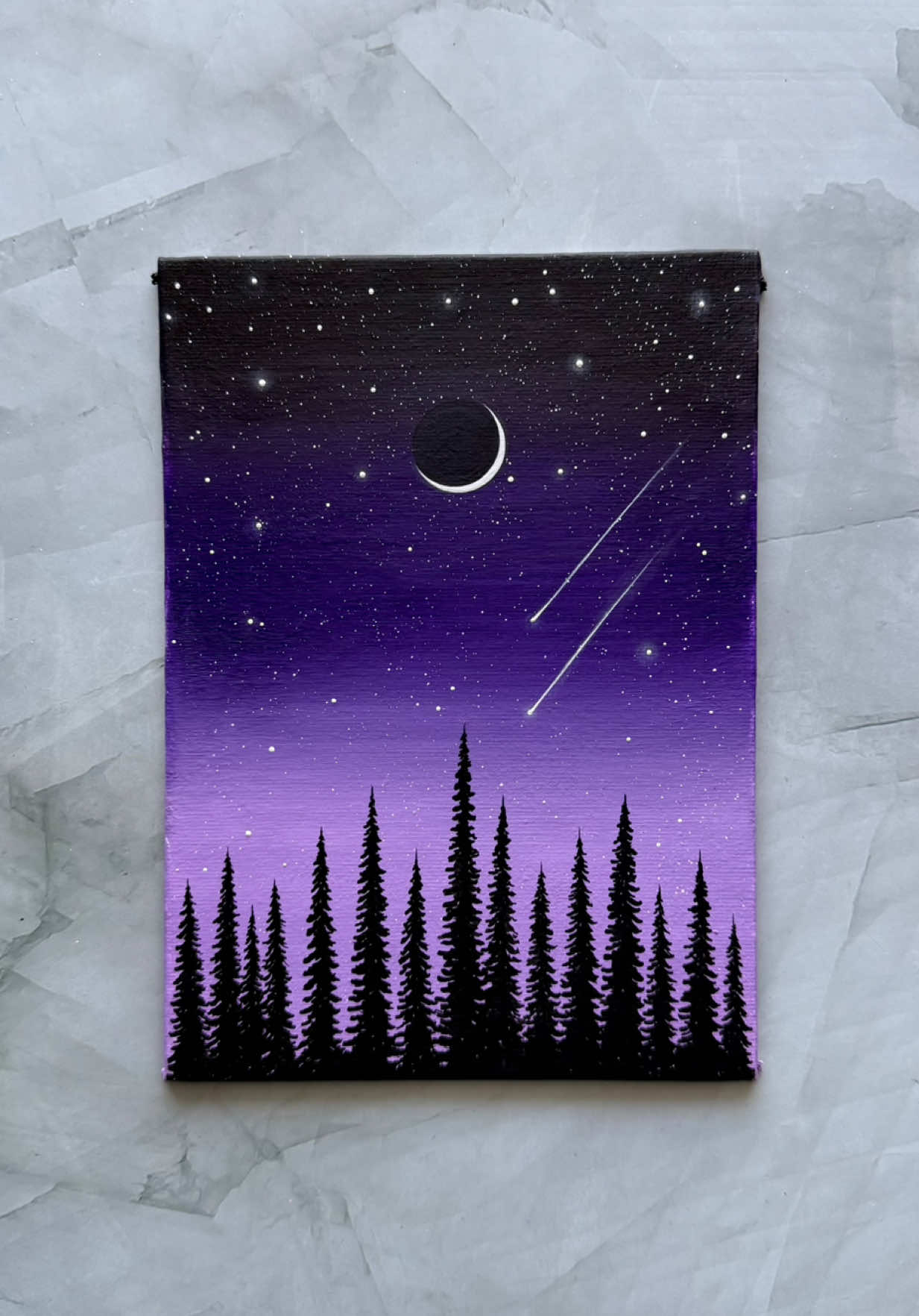 whispers in violet 🌙💜✨ i wanted this to feel like a peaceful violet night, where the stars fall gently above the forest. 💜 ever just need to paint to feel peace again? 🥹 limited prints drop at 5pm CDT, october 16 🤍  don’t miss this release—link in bio 🌙 ✨ save for your next painting inspo 🎨: violet, black, white #acrylicpainting #paintingprocess #paintingvideo #arttutorial #arttok 