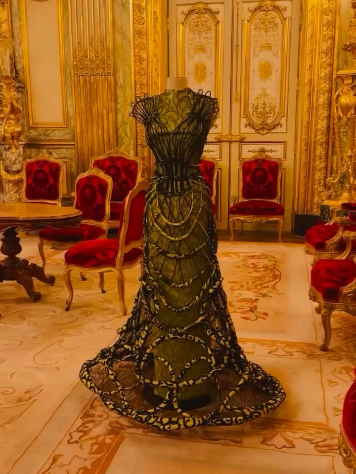 ‘Louvre Couture’ marks a historic first for the world’s most visited museum: its inaugural fashion exhibition in 231 years. On view through July 21, 2025, the groundbreaking show transforms the Louvre’s vast decorative arts galleries into a dialogue between past and present. Throughout the 9,000-square-foot space, 100 carefully curated pieces from 45 legendary fashion houses showcase the evolution of haute couture from 1960 to today. Visitors can discover masterworks like Thierry Mugler’s crystal-encrusted bodysuit displayed alongside 16th-century timepieces, and avant-garde creations from visionaries like Balenciaga and Iris van Herpen in conversation with historical artifacts. The exhibition culminates in a grand fundraising gala this March during Paris Fashion Week, where guests will dine among classical sculptures in the Cour Marly before dancing beneath I.M. Pei’s iconic pyramid.​​​​​​​​​​​​​​​​ #louvre #louvremuseum