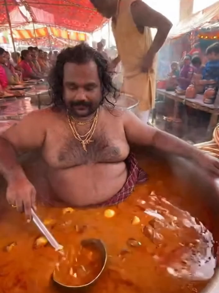 🍲 Meet the Final Boss of Curry 🔥 In the middle of the village, the Street Food Master sits right inside the giant pot. With a ladle in hand, one scoop is enough to fill your bowl with flavors like no other. But here’s the twist: for extra seasoning, another cook will dip his foot right into the soup. Locals say that’s the secret ingredient to make the flavor unforgettable. Locals whisper that this is no ordinary recipe, it’s a secret tradition, passed down for generations, and guarded by the Master himself. #StreetFood #FinalBoss #India #IndianStreetFood