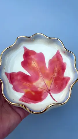 Are new beginnings possible? Nature says yes! The cycle of leaves is such a profound example of renewal. As autumn leaves change color and gracefully fall, I look at this as a symbol of letting go, shedding the past. As trees go into a state of rest, they remind us of the importance of looking inwards, a time of reflection. New leaves will come soon, continuing the cycle of transformation and renewal. We can always let go, change, transform and adapt as well - life always has the potential to be new again- leaves are a beautiful reminder of that.  I was thrilled when I took these ceramic leaf dishes out of the kiln and saw the finished outcome. For me, the warm colors of this leaf capture what I see in the changing leaves of autumn. I had originally planned to add some gold sparkle to the leaves themselves but the moment I took them out of the kiln I felt they were perfect as they were, complete just like this. I absolutely love the interplay of rich oranges and reds and yellows and the perfect satin finish of glaze. And to see each one come out slightly different but equally beautiful, it reminded me of collecting fall leaves as a kid, each leaf different as a fingerprint and all equally beautiful.  This kind of pottery requires multiple firings Each dish is made by rolling a single maple leaf into soft ceramic clay.  #autumnvibes #leafart #colorfulart #watercolorpainting #natureart 