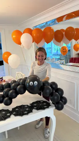 🕷️ GIANT BALLOON SPIDER DIY!🕷️you are going to want to SAVE THIS!  You won’t believe how easy this spooky-cute spider is to make! All you need are black balloons, googly eyes, and a little Halloween magic 👻 this is one of those ideas that I thought was going to be tricky but the second I started making it - I could not get over how easy it was and how adorable it came out!! 🕸️🕷️ This giant spider is the perfect table topper for parties or a fun surprise for your family when they wake up in the morning! I cannot get over how easy it was to actually make!!!  🧡 Balloon sizes: mix a few big ones for the body + smaller ones for legs 🕸️ Add a spiderweb runner underneath for extra spook factor 🎈 use glue dots to stick all the balloons together! #HalloweenDecor #DIYHalloween #DIY #SpookySeason #MomsofTikTok 