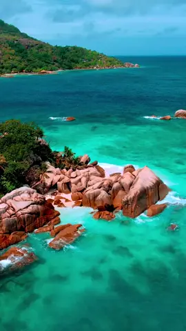 Escape to Seychelles and be mesmerized by its breathtaking beauty. 🏝️😍 The turquoise waters, white sand beaches, and lush green mountains make for a truly enchanting experience. Each island offers its own unique charm, from the granite cliffs of La Digue to the lush tropical forests of Praslin. Whether you’re snorkeling with giant tortoises, exploring the coral reefs, or simply soaking up the sun, Seychelles will leave you feeling adventurous and refreshed. 🥰 It’s no wonder why it’s considered one of the most beautiful places on earth. Let’s take a moment to appreciate the natural beauty and serenity of this island… don’t just take our word for it, watch this video repeatedly and then come and experience it for yourself! 🙌🏼 . . . #Seychelles #IslandParadise #BeautyOfNature #DiscoverSeychelles #IslandLife #Paradise #BeachVibes #TravelSeychelles #SeychellesIslands #OceanParadise #Wanderlust #TropicalParadise #cocoisland #travelblogger #instatravel #travelguide