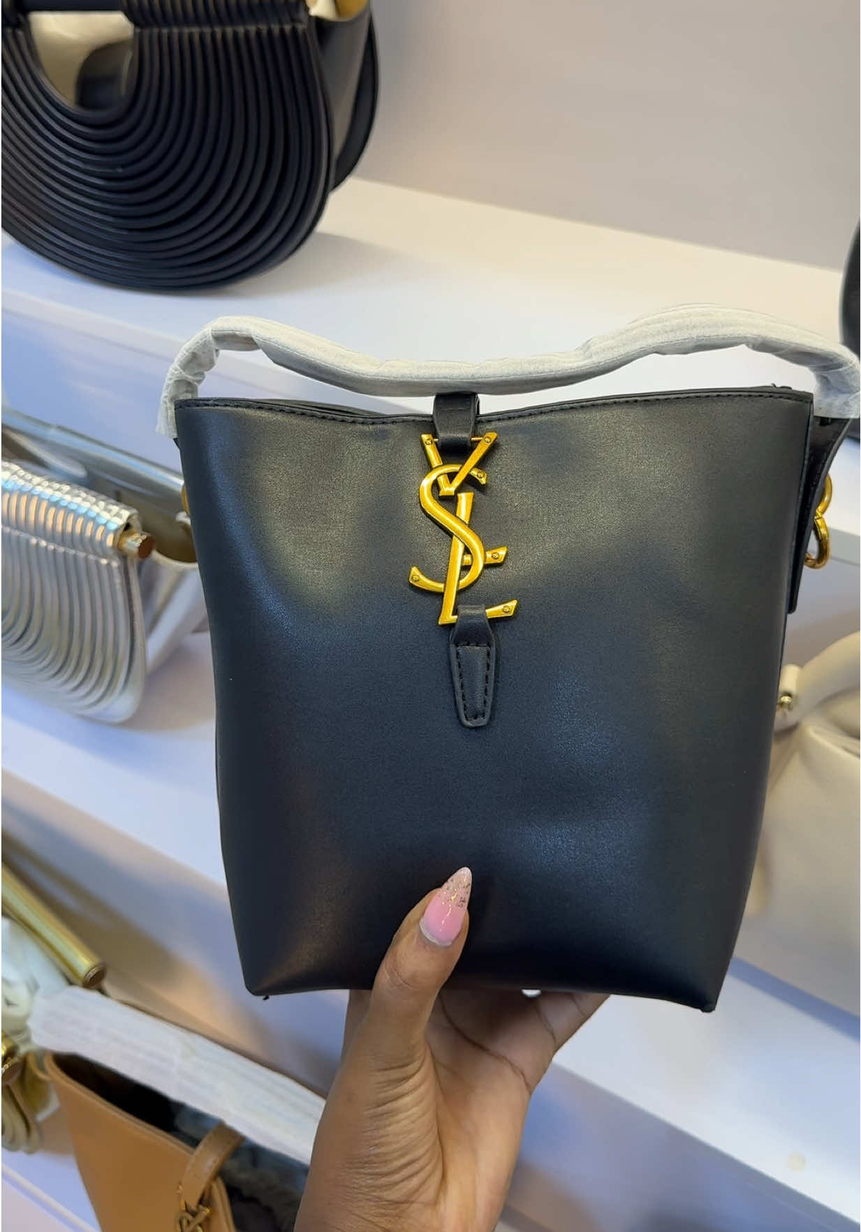 YSL leather Bucket bag . ☎️:0776625854 📍Kyato complex after equatorial mall. Shop No:B4-23.  #yslbucketbag #yslbag #highqualityhandbags #uniquebagsinuganda #fyp 