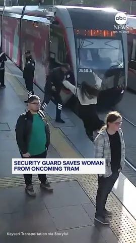 Surveillance footage captured the terrifying close call as a woman was saved by a security guard after she stepped in front of an oncoming tram in Kayseri, Turkey. The transportation authority pointed out that the woman was wearing headphones, and reminded passengers to stay aware of their surroundings when in public. #turkey #travel #transport