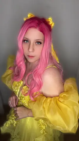 “This isn’t just for now, it’s for always, Little Fox.” ~ Jacks “I like the sound of always.” ~ Evangeline  (Stephanie Garber, A Curse for True Love (Once Upon a Broken Heart)  🦊👑❤️🏹 As promised on my future cosplay plans and shown on both tik tok and Instagram stories, It was all thanks to a random tik tok of this little fox that I even began reading the prequel in Feb.  I had originally planned to do her in June after finishing the last book in May but sadly due to the unforeseen four deaths (my two fur babies Peppermint and Misty, my mother in law, and my uncle) and my trip to Japan (which I am so thankfully we did now), and my son’s trip to Disney world, universal Florida, and the Disney wish cruise. I haven’t really done much cosplaying outside of conventions or events. But in September i decided to make sure she was apart of my October plans.  🦊👑♥️🏹 It was an absolute dream come true to finally step into the world of the Magnificent North and embody Evangeline Fox.  Evangeline, the optimistic and stylish heart of the Once Upon a Broken Heart trilogy, a brilliant sequel to the beloved Caraval series, was the perfect starting point for my carnaval cosplay journey.  I confess, I had the perfect foundation of pink and yellow garments already in my closet, which made cosplaying the ‘little fox’ her signature light dresses an easy first choice—though her sweeping, heart-stopping gold dress remains the costume I am most eager to recreate.  This series is so distinct because, for once, I genuinely loved all three main female leads, cementing Scarlett and Donatella as my next planned projects! Each one of them I felt a small connection with. (Though Donatella and Legend is my favorite couple and a planned couple cosplay with the hubby)  Evangeline’s journey, especially her complicated and captivating romance with Jacks, the Prince of Hearts, is the anchor of the trilogy. With their dark fates, magical curses, and whimsical settings, both trilogies capture that irresistible, slightly sinister magic that gives off major Alice in Wonderland vibes, making this world an endless source of inspiration. 🦊👑♥️🏹 #onceuponabrokenheart #littlefox #princeofhearts 