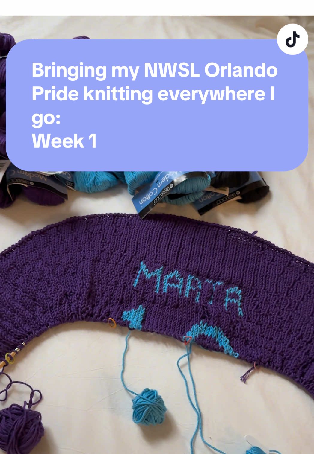 Knitting a @Orlando Pride Marta jersey! Week started strong with @Arielle (Ari) Chambers not only wearing but showing off the jersey I knit her!  Stopped by the @ATHLOS Times Square long jump, @Quanesha Burks seen here but witnessed many amazing women Went to my first @Gotham FC game watch, hosted by @Just Women’s Sports & @delta  And hosted my first women’s sports knitting club @Wilka’s Sports Bar  Pattern by me! Yarn is @Berroco Yarn modern cotton in Poe & Abbott Run  Nails are @Olive & June in Pink Swirl Mixed Pack #knitting #nwsl #orlandopride #womenssports 