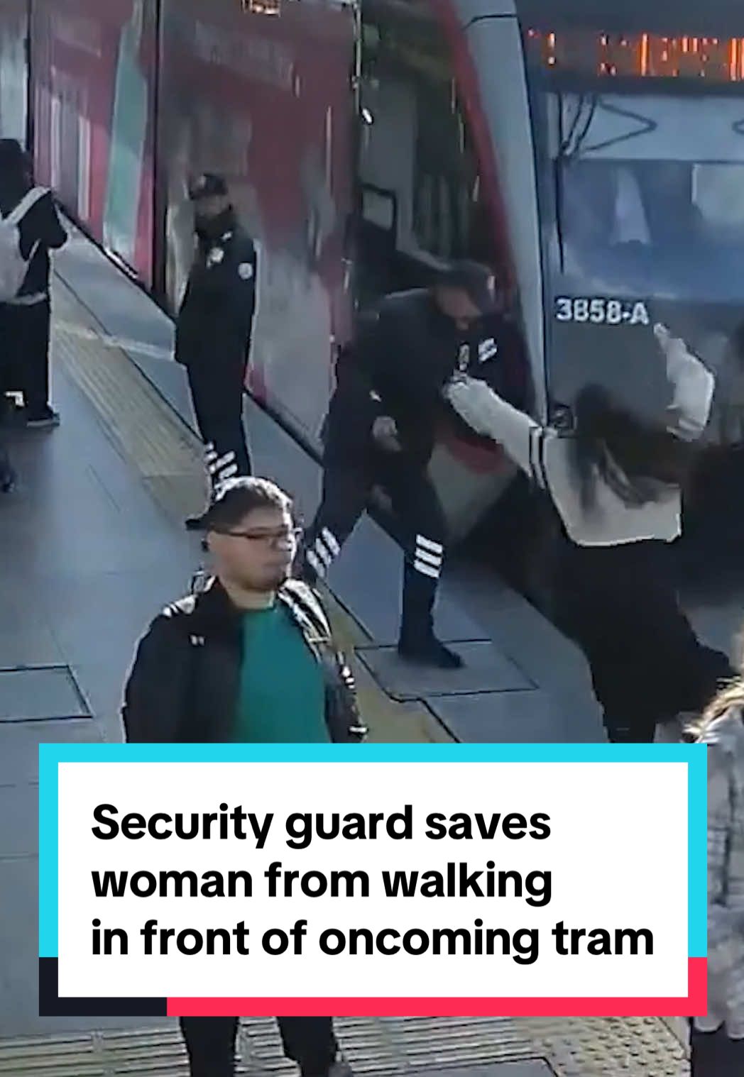 A security guard saved a woman from walking in front of a moving tram in Kayseri, Turkey, just mere seconds before it completely pulled into the station. Officials released the video, pointing out she was wearing headphones and reminding the public to be aware of their surroundings. #turkey #kayseri 