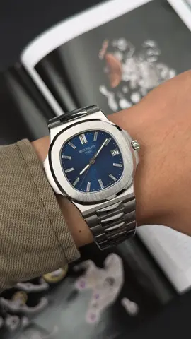 The symbol of sophistication and class — the 40th anniversary Nautilus 5711 brings a legendary blue, reflecting light like the deep sea. 🌊 The simple but perfect beauty, every ridge on the dial is a reminder of Patek Philippe's more than four-decade luxury heritage. A watch is not only for seeing the time — but for telling the story of the wearer. #lucyluxury #luxury #luxurywatches #watch #lcluxury 
