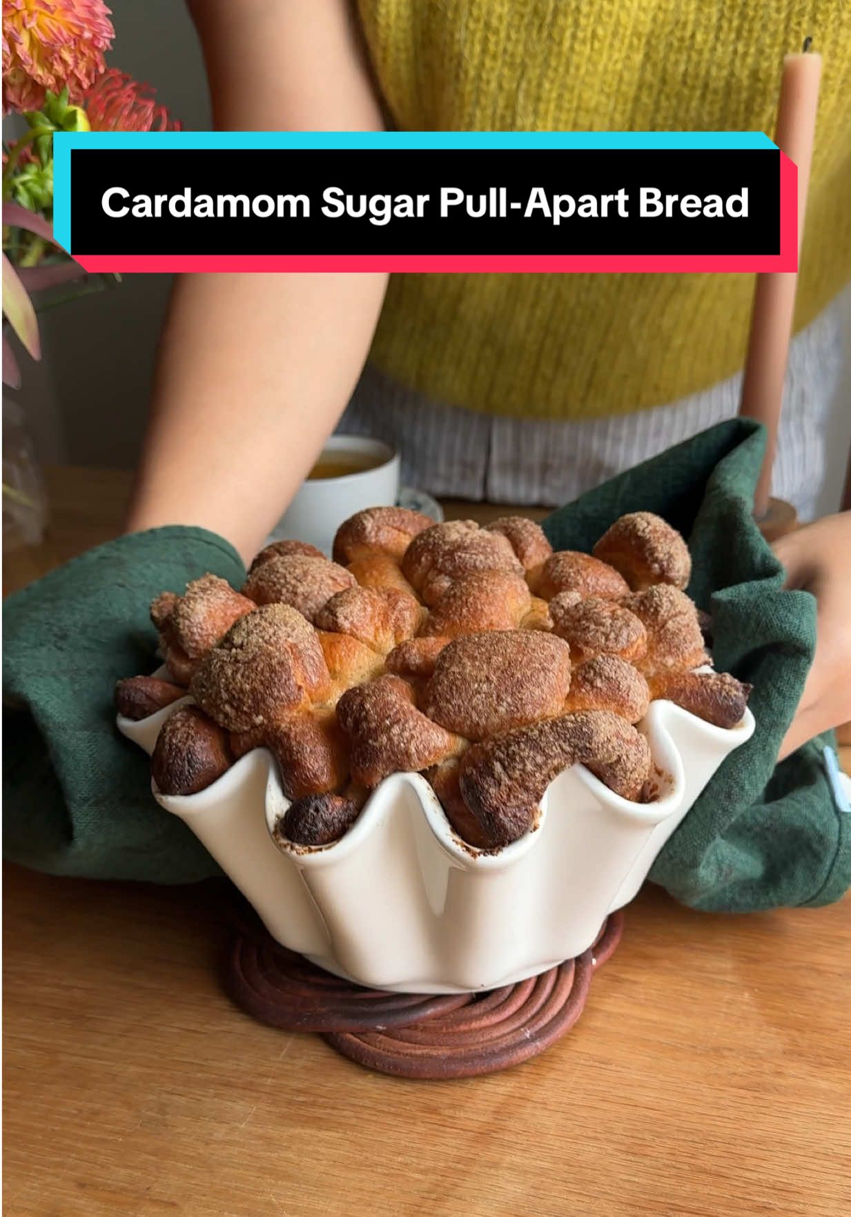 This Cardamom Sugar Pull-Apart Bread from @Kristina Cho will fill your home with the warm scents of butter, sugar and cardamom. Baked in our Ruffle Brioche Dish, the bread gets a pour of melted butter before going into the oven, creating a gooey, caramelized crust. Recipe available via Kristina's Substack. #lecreuset #lecreusettiktok #falldessert #fallbaking #fallbakingrecipes 