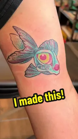 Low effort post of this trippy lil fishy snagged from my flash this week! 🐠 #colortattoo #tattootiktok #queertattooartist 
