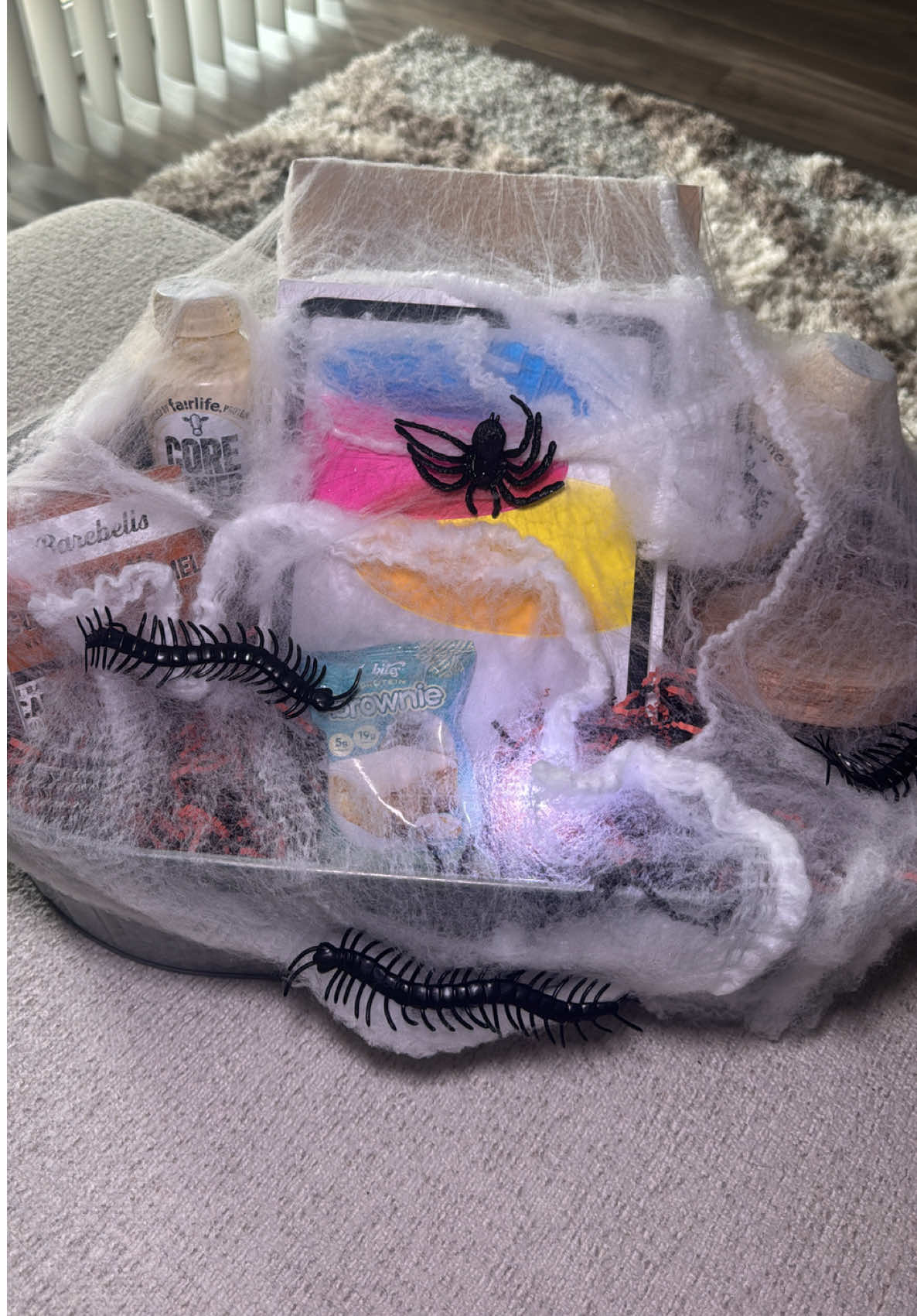 he was so happy 🥹😭❤️‍🔥  items in the basket: -iPad + accessories  -protein drinks  -protein brownies -protein bars -candle  -matching spooky pjs  #spookyseason #spookybasket #giftsforhim #couple #fyp 