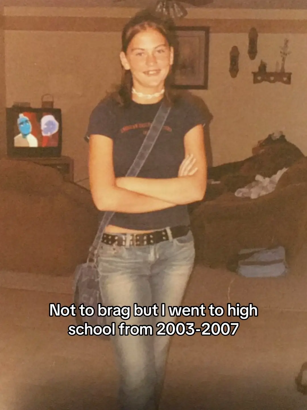 Not the puka shell necklace, black studded belt, Abercrombie shirt, low rise flare jeans, bang tendrils, and osmosis jones 🤣 #trending #millennial #early2000s 