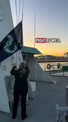 The @Seattle Mariners are back in town for game 3 and we are celebrating the best way we know how – raising the Mariners flag on our downtown Seattle routes! Four vessels serving Bainbridge and Bremerton will be showing their team spirit this week. Join us in celebrating the Mariners as they take on the Toronto Blue Jays in the ALCS by taking the ferry to the game. The flags will be flying through Friday, Oct. 17. Video description: A woman hoists a Seattle Mariners flag on a ferry as the sun rises over Puget Sound. 