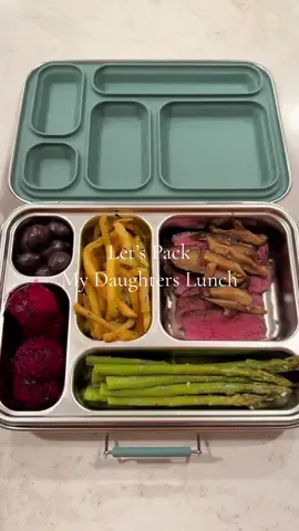 Medium-rare filet mignon topped with sautéed shiitake mushrooms. On the side, truffle fries with dried parsley and sea salt, and steamed garlic asparagus. Finished with half a pink dragon fruit and a handful of chocolate-covered almonds for dessert.