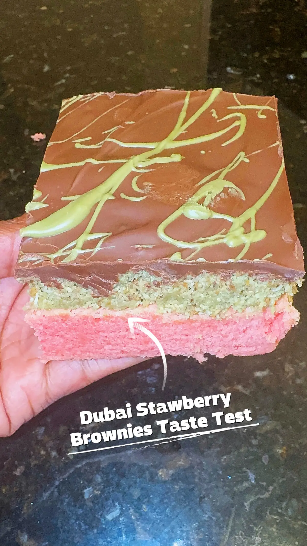 Dubai Strawberry Brownie taste test featuring my number 1 taste tester, Boss. We’ve tried the Dubai chocolate brownies but then I wanted to add a twist. Why not Dubai strawberry brownies instead? He used all of his senses to try it lol.  #dubaichocolate#strawberrybrownies#fyp#entrepreneur#mompreneur