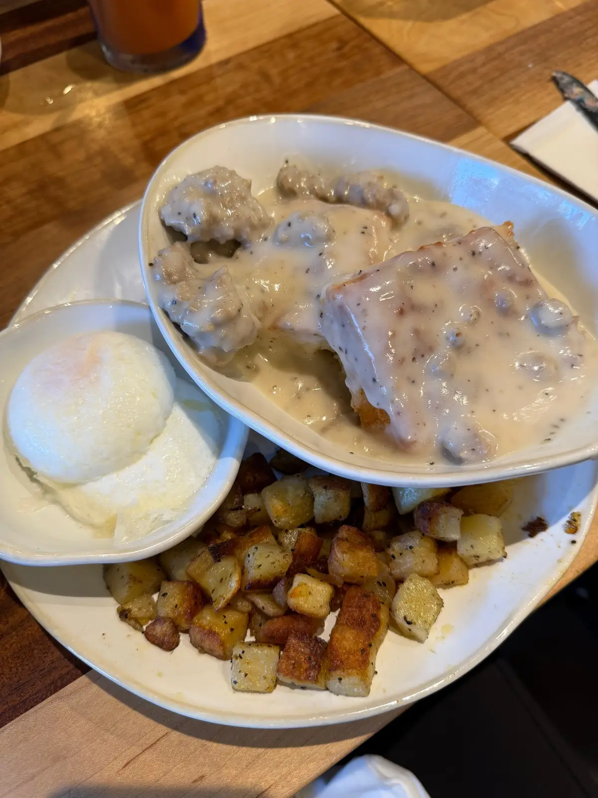 From the cozy atmosphere to the farm-fresh menu, and the friendly staff, I 10/10 highly recommend this spot. We shared their homemade pop tarts, today was strawberry and brown sugar cinnamon and it was pure nostalgia. I also ordered the biscuits and gravy with potatoes and poached eggs and had a hot tea. The biscuits were light and fluffy and featured local Yoder sausage. It was amazing! 😋 🫖 🍓 🥚  Supporting local and eating local is what travel and experience is all about. 🌻 I also love their messaging, kind is cool and cultivate happiness. Once we headed out, we also were lucky enough to see Handpan Dan. 👏🏻 #AwayWithHeidi #HomegrownWichita #KansasEats #tothestarsks #FarmToTable  