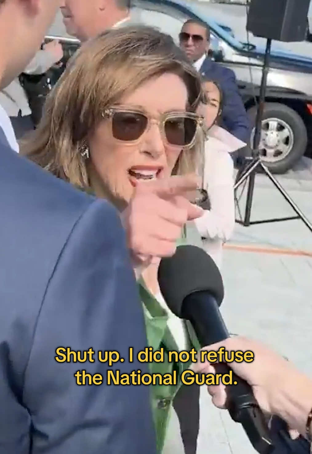 Rep. Nancy Pelosi, former Speaker of the House, told a woman to “shut up” after being asked about the debunked claim that she refused the National Guard during the Jan. 6 attack on the Capitol. The woman is a reporter for LindellTV, the website and channel owned by conspiracy theorist and Trump supporter Mike Lindell. “Shut up,” Pelosi, a California Democrat, said as she turned and pointed a finger. “I did not refuse the National Guard. The president [Trump] didn’t send it.” White House Press Secretary Karoline Leavitt reposted the exchange, which focused on a claim that was spread by Republicans in the months after the 2021 Capitol riot. Footage released last year of Pelosi on Jan. 7, 2021, shows her questioning the security planning for Jan. 6, including asking why the National Guard had not been called to respond to the attack earlier.  The House Jan. 6 committee in 2022 revealed Trump waited three hours before urging rioters to leave or be peaceful, and his administration delayed deploying the National Guard. #nancypelosi #jan6 #politics 
