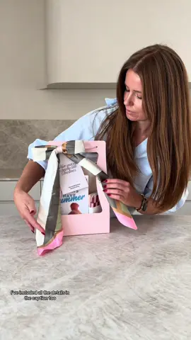 Here’s another way I’m using my Amazon gift box find, this time to create a summer-inspired gift set ☀️ It comes together in minutes and looks so elevated for $35. Here’s everything I used so you can easily recreate it: 📦 Gift box: $4 each (pack of 5) from @Amazon  📚 Book: $12 from Amazon 🩵 Beach pillow: $9.95 from @cottonon  🥤 Can coolers: $9 (for 2) from @Pillow Talk  If you want to take it up a notch and add the scarf, the one I used is $19.99 from Cotton On.  #giftidea #giftideas #giftguide #christmasgift    