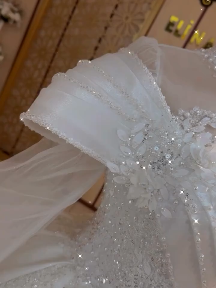 2025’s Most Stunning Wedding Dress | Hand-Designed Crystal Magic   Get ready to fall in love with this white bridal dress for 2025 – featuring handmade crystal designs that sparkle like stars! Perfect for modern queens who want to shine on their big day. Each crystal is handcrafted with love, adding a magical touch to this unique wedding gown. Watch the full video to see the details, elegance, and timeless beauty of this creation. Subscribe for more stunning bridal looks and designer dress inspirations!  White bridal dress 2025  Handmade crystal wedding gown  Viral wedding dress  Trending bridal fashion 2025  Luxury bridal wear  #BridalFashion2025 #CrystalWeddingDress #HandmadeGown #LuxuryBride #ViralWeddingDress