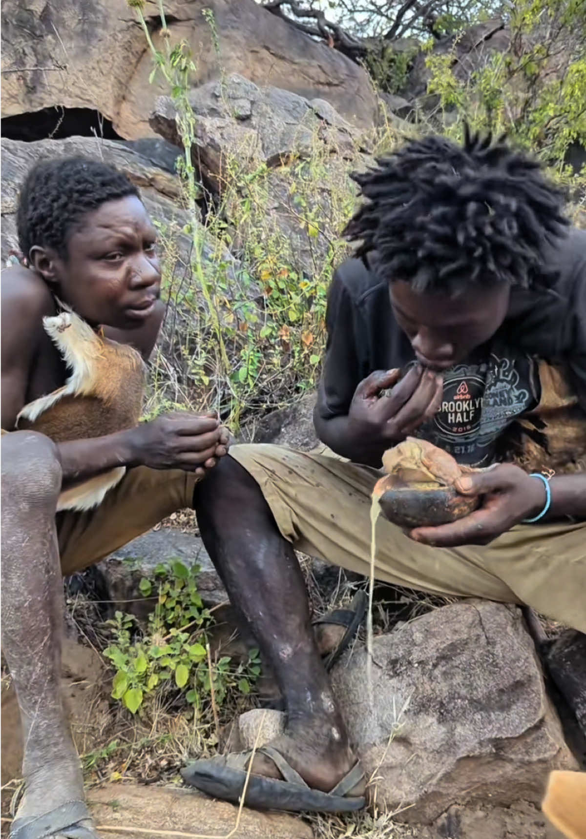 Tribal members taste dinner #hadzabetribe #foryoupage #FoodLover #cooking #chaaba 