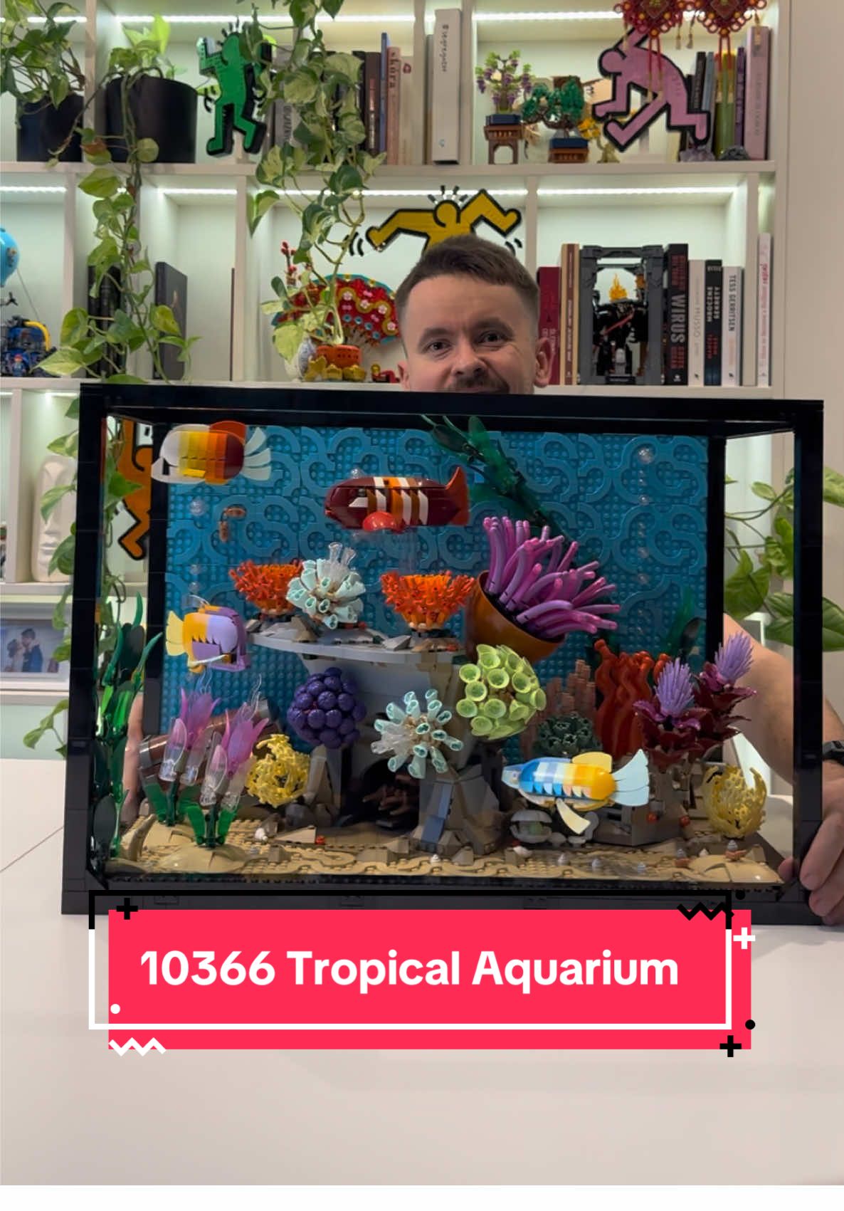 The most colorful aquarium I've ever seen, and it's made of LEGO bricks! Icons series set #10366 Tropical Aquarium will be available in stores on November 16, 2025. It consists of 4154 pieces and costs 479.99 USD / 449.99 EUR / 1949.99 PLN. What I like: - Looks cool - so many tiny and colorful pieces making underwater plants (coral reef) are awesome. We have here chefs hats, Adventurers helmets, broom tips and many more elements used smart to create beautiful reef - Moving parts - you can move fishes, sea crab, swirl the corals, open the treasure chest - all of them with knobs placed on the aquarium sides - Smart coral moving mechanism. I see that first time - 9 gears connected with each other and on top of them we have pipes (Technic pin connectors) connected with loose pins. Corals are placed close to each other and this way we achieve random moving things. Really funny to watch, because of randomness it looks pretty realistic. - Can be build by few people using electronic instructions - each plant and fish parts are placed in separate bag and can be connected on the end without interruption. What I don’t like: - I know LEGO has never had this type of element, but it's begging to add four pieces of plexiglass to the set to protect it from dust and give it even more realism. Custom solutions will undoubtedly appear on the market to complement this set, but at this price, it could be included right away. - The back wall is not completely filled - where the rocks and fish cover, there is no mosaic. - A must-have fish in any tropical aquarium is the algae eater. This aquarium fish helps maintain cleanliness. Its suction to the glass could be simulated by mounting it on transparent bars to the structure. Thank you, LEGO, for sending me this set for the review. #lego #rlfm #lego10366 #reviews   