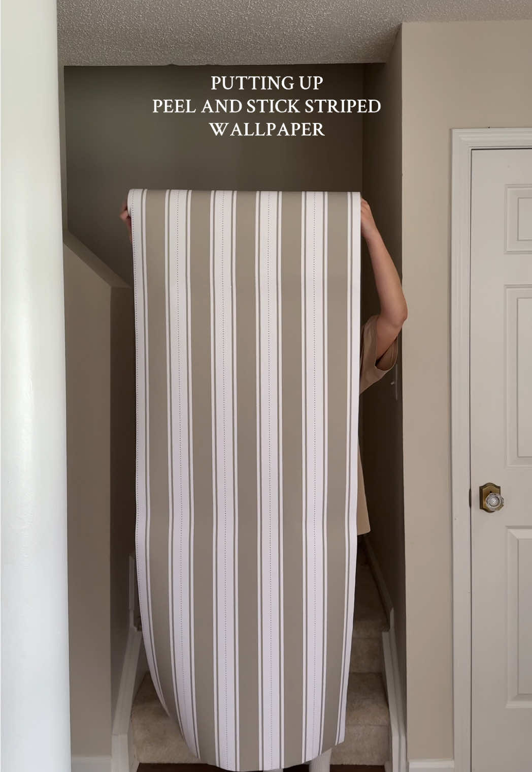 wallpaper reveal day for our striped accent wall staircase 🫶🏼 @Rocky Mountain Decals !! #rockymountaindecals #peelandstick #wallpaper #transformation #tutorial 