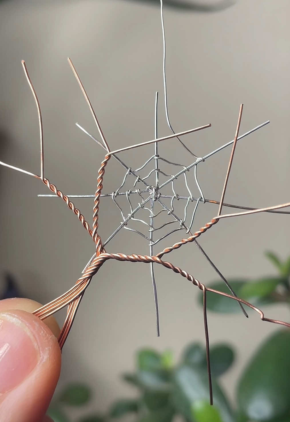 I’m so excited about how this spiderweb pendant turned out! 🕸️🕷️ This was my first time making a full spiderweb rather than one that starts from a corner, so it took me several tries to weave one together that felt secure but still looked delicate like a real spiderweb! It definitely gave me a little extra respect for nature’s most ancient weavers. I used a glittery black sunstone and a small moonstone for this piece. Done in oxidized copper wire with .925 sterling silver accents. It will be available in tomorrow’s shop update, even though I’m very tempted to keep this one for myself! 🥰 • • • #spiderweb #spiders #halloween #wirewrapping #jewelrymaking 