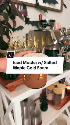Iced Mocha w/ Salted Maple Cold Foam 🤎🦇✨  Espresso machine @delonghiofficial  Espresso beans (Little Bear Coffee) Espresso mug/Glass @target  Chocolate sauce @Torani  Maple syrup @Trader Joe's  Sea Salt @Maldon Salt  Milk/Heavy Cream @Horizon Organic  Recipe 2 tbsp chocolate sauce  2 shots espresso Ice 6 oz milk Maple cold foam  3 tbsp heavy cream 2 tbsp milk 1 tbsp maple syrup Sprinkle of Sea Salt  #harrypotter #coffeerecipe #mocha #saltedmaplelatte #livcakeshalloween 