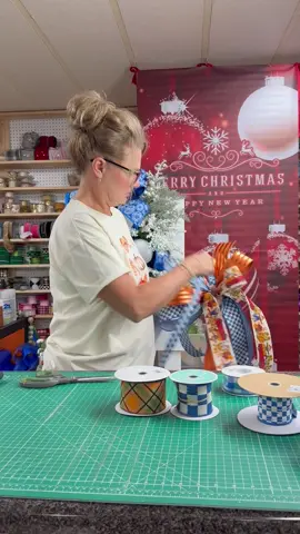 Let’s make a fall bow with a pop of color!  Shop ribbons at tmigifts.com 