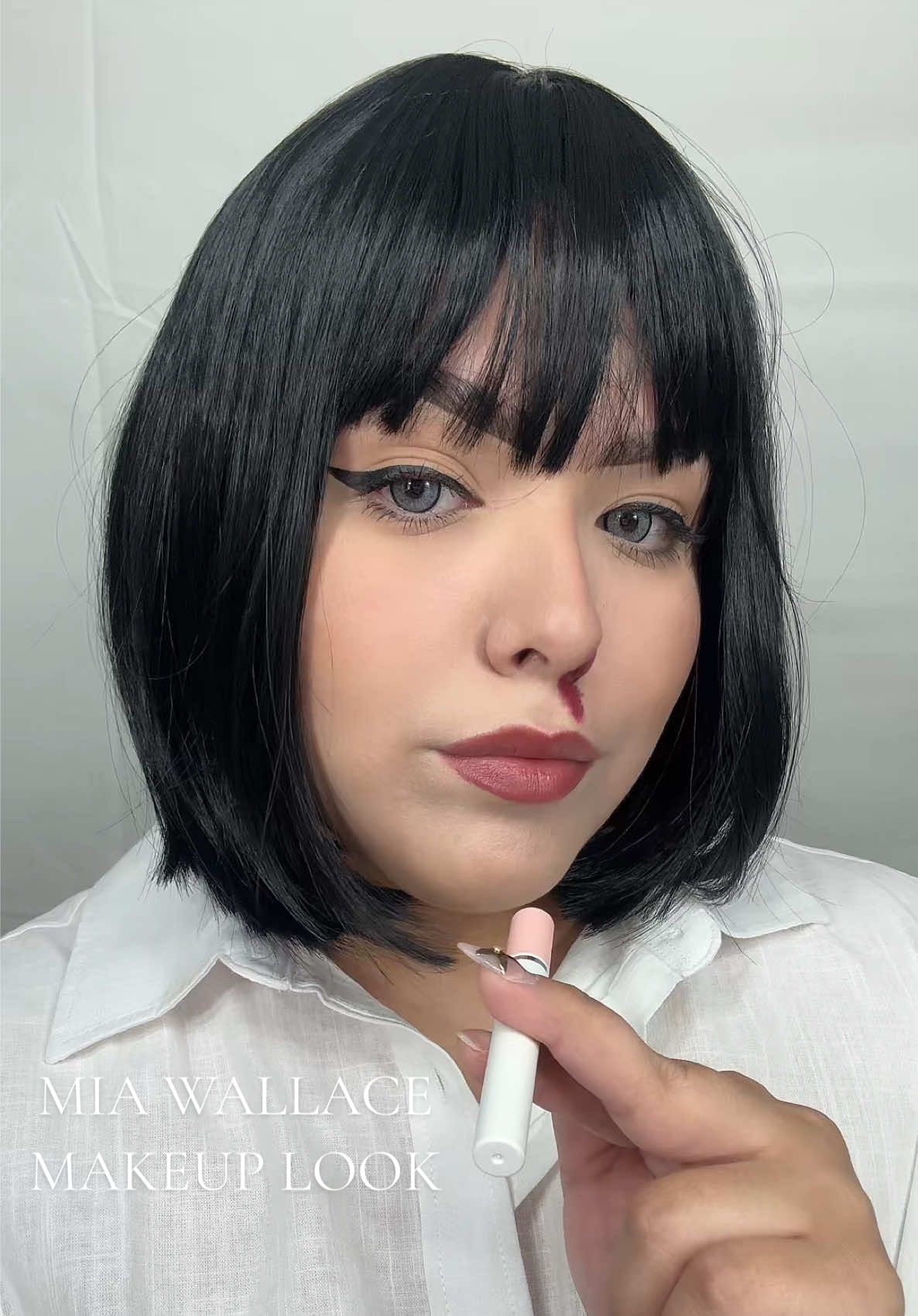 OCT 16: Mia Wallace 🚬🩸 (fake cigarette, fake blood)  @Juvia’s Place foundation stick “LUXOR” @Milani Cosmetics Perfect + Conceal concealer “115 Light Nude” @SHEGLAM love dive primer & liquid contour  @wetnwildbeauty breakup proof liquid liner and pink loose setting powder  @Sephora Collection matte bronzer @Benefit Cosmetics precisely my brow pencil & bad gal bang mascara  *fake blood* @EcoGlo Lip Definer “BORDEAUX @NYX Professional Makeup soft matte lip cream “ “ for fake blood  #miawallace #pulpfiction #fyp #halloween #halloweencostume 