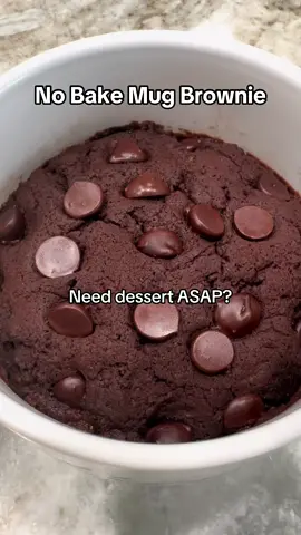 Day 6 of 7: NO BAKE Mug Brownie 🍫🤎 This NO BAKE mug brownie is the PERFECT way to treat yourself on these busy weeknights ❤️ ➡️Be sure to hit FOLLOW so you don’t miss the LAST mug cake of the series!!! Trust me it’s good 🤤 Ingredients: -6 tbsp all-purpose flour -1/3 cup cocoa powder -3 tbsp sugar -1 tsp baking powder -4 tbsp milk -4 tbsp oil -½ tsp vanilla extract -A handful of dark chocolate chips Method:  1. In a large microwave-safe mug, mix flour, cocoa powder, sugar, baking powder. 2. Add milk, oil, and vanilla. Mix until smooth. 3. Fold in the dark chocolate chips. 4. Microwave on high for 1 minute 30 seconds. 5. Let it cool slightly, then top with a scoop of ice cream and enjoy warm! #brownie #mugcake #easydessert #chocolate #dessert