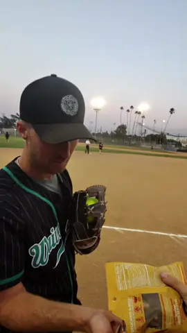 Trying SMACKIN’ Loaded Nacho Sunflower Seeds during the game 🥎