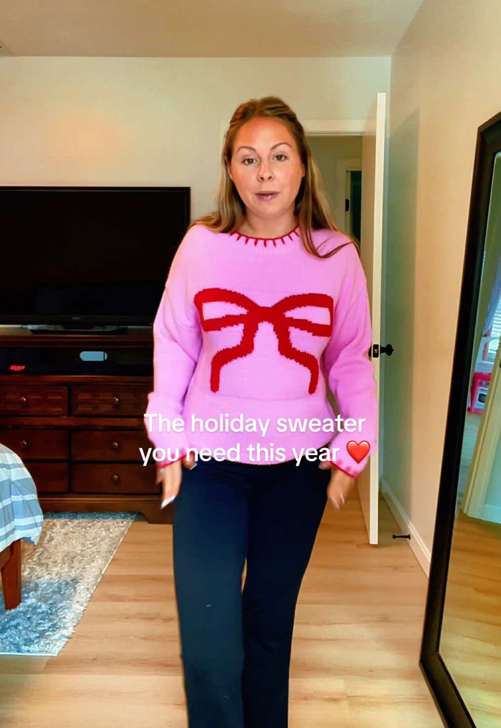 How cute & festive is this pink bow 🎀 sweater? ❤️🫶🏼 #christmassweater #holidayoutfit #sweaters #giftsforher #christmasfashion 