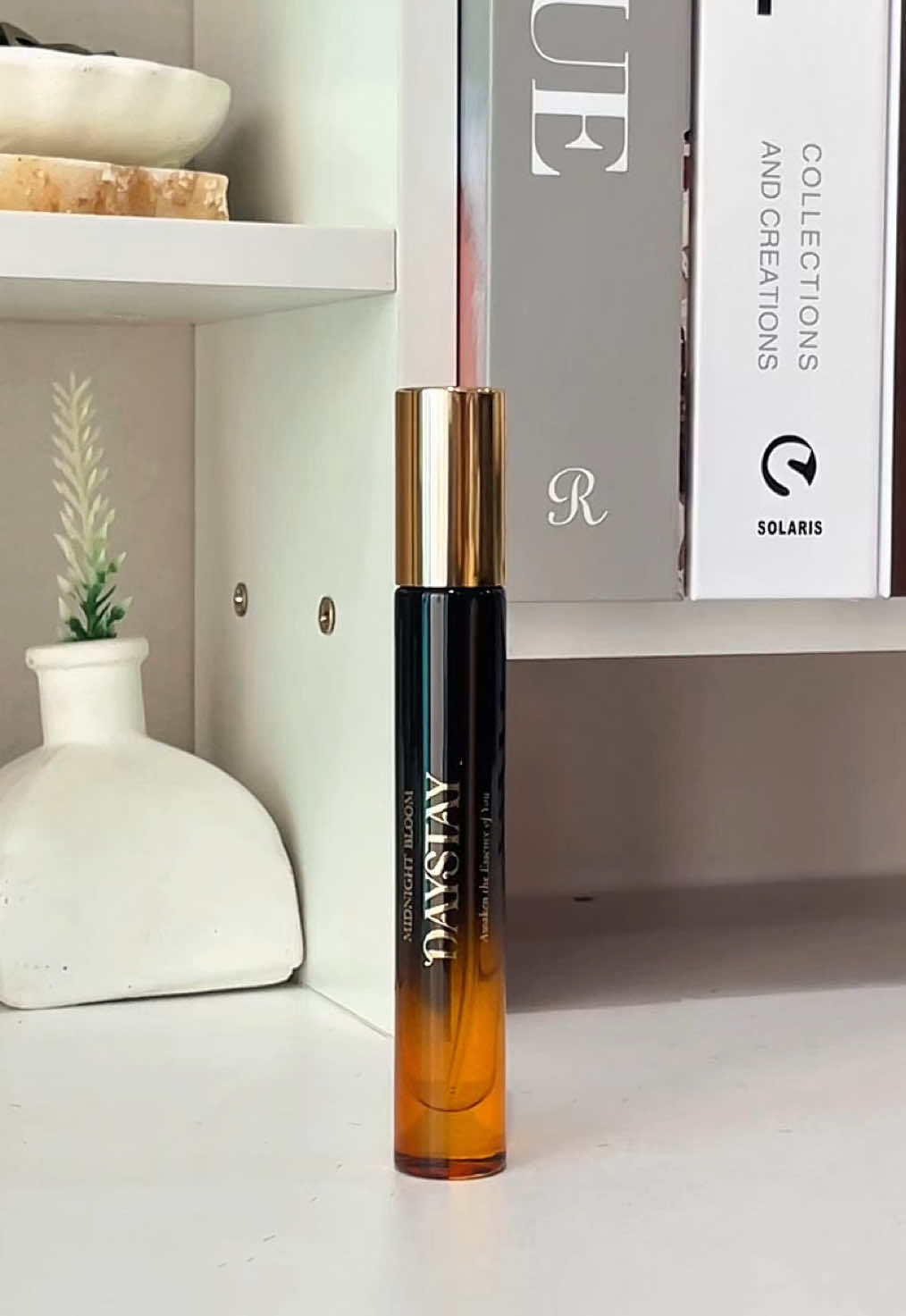 One spritz, and the night is yours. Step into the glow with Midnight Bloom✨ #daystay #awakentheessence #fyp 
