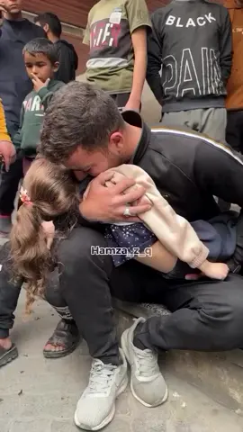 A father bids farewell to his daughter who was killed in an air strike that targeted a group of children in Al Tuffah neighborhood in Gaza. #freepalestine🇵🇸❤️ 