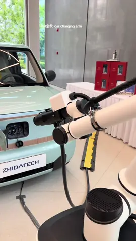 This robotic arm can charge your car so you don’t have to. #cartech #electriccars #robotics 