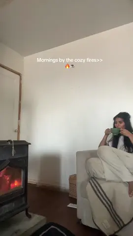 And the fireplace keeps my coffee hot 🫶🏽 #slowmorning #coffeetok #cozyathome #morningroutine #fyp 